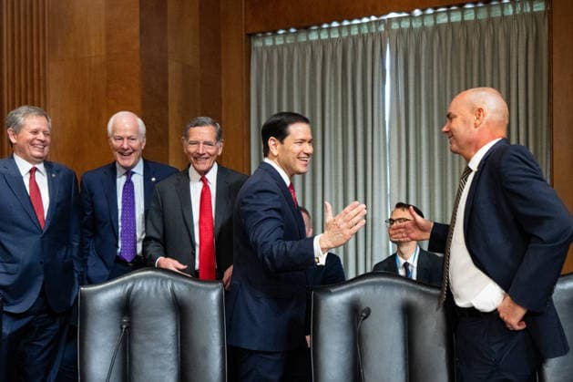 Secretary of State Marco Rubio UNITED STATES - JUNE 2: Secretary of State Marco Rubio, center, shakes hands with Sen. Mike Lee, R-Utah., right, as he arrives to testify to the Senate Foreign Relations Committee hearing on the budget request for the State Department in the Dirksen Senate Office Building on Tuesday, June 2, 2026. Looking on in the background from left are Sen. Steve Daines, R-Mont., Sen. John Cornyn, R-Texas, and Sen. John Barrasso, R-Wyo. (Bill Clark CQ Roll Call) Washington DC United States EDITORIAL USE ONLY Copyright: x 2026xCQxRollxCallx BillxClarkx rollcallpix171278