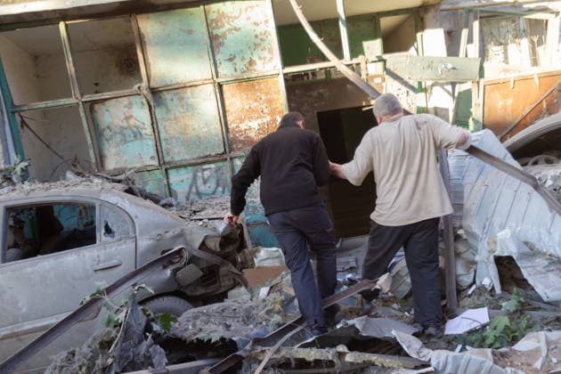 Aftermath of Russian overnight attack in Kyiv™s Podilskyi district Two men struggle through the rubble towards a nine-storey apartment block in the Podilskyi district, damaged by a massive Russian missile and drone attack, Kyiv, Ukraine, on 2 June 2026. The overnight strike killed six people and injured 79, including three children, in the Ukrainian capital. In the Podilskyi district, residential buildings, a garage cooperative, a communal enterprise, and a four-storey educational institution sustained damage as a result of the attack., Credit:Kirill Chubotin Ukrinform Avalon Ukraine, Kyiv  Copyright: xKirillxChubotinx xUkrinformx xAvalonx 1107310022