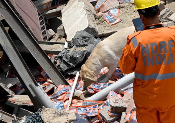 NEW DELHI, INDIA - JUNE 2: NDRF team conducts a search and rescue operation as a building collapsed after the cylinder blast in Mukundpur, Burari, on June 2, 2026 in New Delhi, India. Neighbours and officials alleged that a large number of cylinders were being stored illegally inside the house where the blast occurred. (Photo by Ishant Chauhan Hindustan Times ) House Collapses After Cylinder Blast In Delhi™s Mukundpur, People Feared Trapped Under Debris