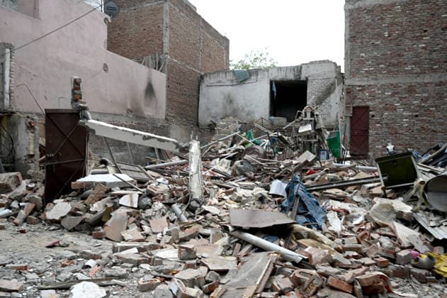 NEW DELHI, INDIA - JUNE 2: NDRF team conducts a search and rescue operation as a building collapsed after the cylinder blast in Mukundpur, Burari, on June 2, 2026 in New Delhi, India. Neighbours and officials alleged that a large number of cylinders were being stored illegally inside the house where the blast occurred. (Photo by Ishant Chauhan Hindustan Times ) House Collapses After Cylinder Blast In Delhi™s Mukundpur, People Feared Trapped Under Debris