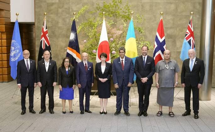 Japan PM Takaichi meets island nation leaders Japanese Prime Minister Sanae Takaichi (C) poses for a photo at the prime minister s office in Tokyo on June 2, 2026, ahead of her meeting with leaders of island nations.  A14AA0005617446P