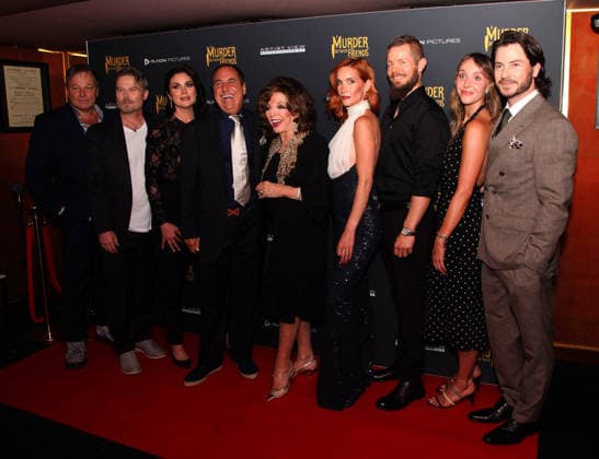 Murder Between Friends premiere London, UK. Joan Collins (centre) with cast and production at the Murder Between Friends premiere. Curzon Mayfair. 2nd June 2026. LMK11-S030626-001 Steve Bealing Landmark Media 