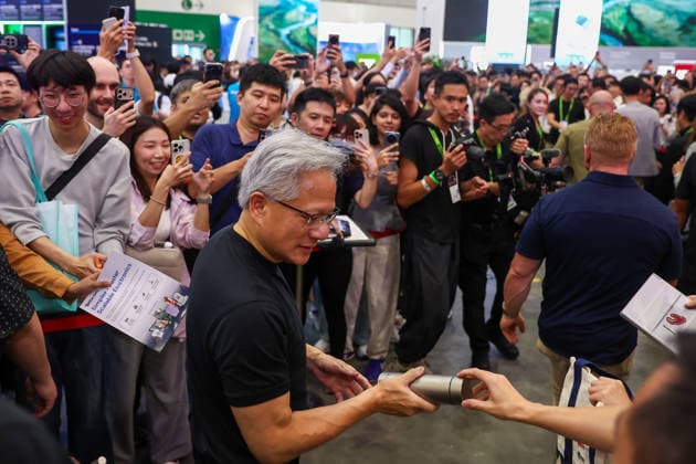 NVIDIA s CEO Jensen Huang visits COMPUTEX TAIPEI 2026 TAIPEI, TAIWAN - JUNE 3: Jensen Huang, the CEO of American multinational tech giant NVIDIA, receives gifts from supporters as he is surrounded by heaps of supporters and staff during his visit to the COMPUTEX TAIPEI trade show, in Taipei, Taiwan, on June 3, 2026. COMPUTEX TAIPEI is one of the world’s largest and most significant trade shows, featuring latest technologies, drones, data centres, Artificial Intelligence (AI) technologies, supercomputers, semiconductors products and other things from major international firms such as Nvidia, Intel, NXP and Foxconn. Daniel Ceng Anadolu Taipei Taiwan. Editorial use only. Please get in touch for any other usage.  Copyright: x2026xAnadoluxDanielxCengx