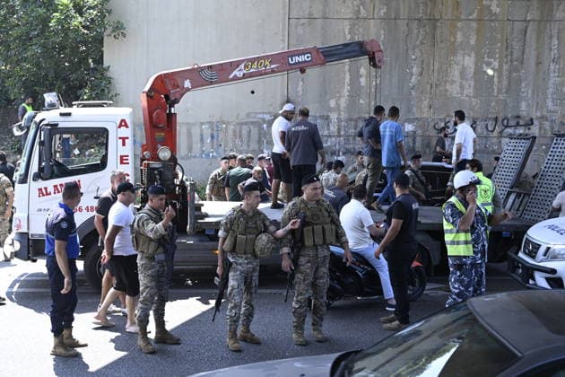 Despite the ceasefire, the Israeli army targeted a car with a drone near Beirut MOUNT LEBANON, LEBANON - JUNE 03: Security forces conduct an investigation at the scene after the Israeli army, despite the ceasefire, targeted a car traveling on the coastal road in the Khalde region of Mount Lebanon Governorate near the Lebanese capital Beirut with an unmanned aerial vehicle (UAV), on June 03, 2026. Material damage occurred to the vehicle as a result of the attack. Houssam Shbaro Anadolu Mount Lebanon Lebanon. Editorial use only. Please get in touch for any other usage.  Copyright: x2026xAnadoluxHoussamxShbarox