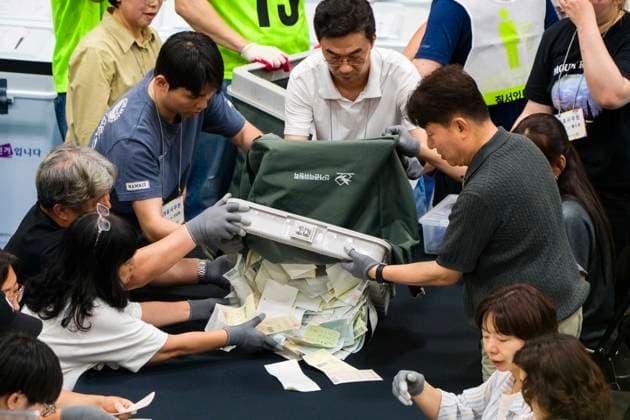June 3, 2026, Seoul, South Korea: Poll workers count ballots after the conclusion of voting in South KoreaÃ¢â‚¬â ¢s local elections on Wednesday, June 3, 2026 in Seoul, South Korea. Seoul South Korea - ZUMAh163 20260603_znp_h163_046 Copyright: xJintakxHanx