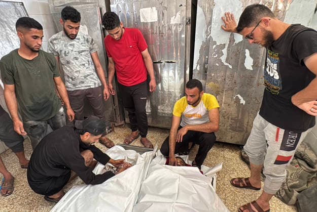 Mourners Bid Farewell to Palestinians Killed in Israeli Strike Relatives and mourners bid farewell to the bodies of Saqr Khalil Abu Karim (al-Aidi) and Moamen Khalil Abu Karim (al-Aidi) during their funeral at Al-Aqsa Martyrs Hospital in Deir al-Balah, central Gaza Strip, on June 3, 2026. The two Palestinians were killed in an Israeli strike that targeted the vicinity of Maki Roundabout in the Maghazi refugee camp, according to medical and local sources. Photo by Ahmed Ibrahim apaimages Deir al-Balah Gaza Palestinian Territory 030626_Deir_al-Balah_AI_01(6) Copyright: xapaimagesxAhmedxIbrahimx xapaimagesx