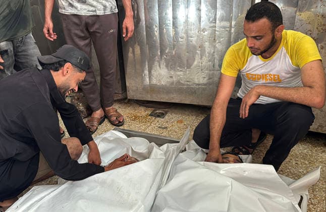 Mourners Bid Farewell to Palestinians Killed in Israeli Strike Relatives and mourners bid farewell to the bodies of Saqr Khalil Abu Karim (al-Aidi) and Moamen Khalil Abu Karim (al-Aidi) during their funeral at Al-Aqsa Martyrs Hospital in Deir al-Balah, central Gaza Strip, on June 3, 2026. The two Palestinians were killed in an Israeli strike that targeted the vicinity of Maki Roundabout in the Maghazi refugee camp, according to medical and local sources. Photo by Ahmed Ibrahim apaimages Deir al-Balah Gaza Palestinian Territory 030626_Deir_al-Balah_AI_01(7) Copyright: xapaimagesxAhmedxIbrahimx xapaimagesx