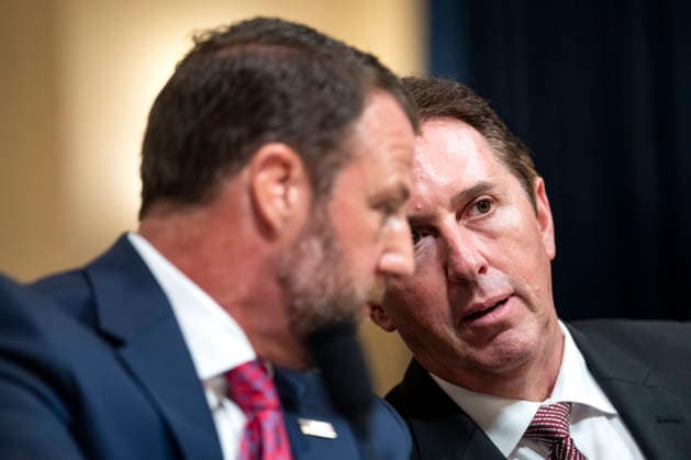 Deputy Secretary of Homeland Security Troy Edgar whispers to Secretary of the Department of Homeland Security (DHS) Markwayne Mullin during a House Homeland Security Committee hearing on the fiscal year 2027 budget request for DHS in the Canon House Office Building near the U.S. Capitol in Washington, DC on Wednesday, June 3, 2026.  WAP20260603500 BONNIExCASH