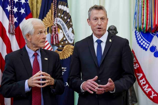 US President Donald J. Trump takes questions from the news media during an executive order signing ceremony Counselor to the president Peter Navarro (L) listens as CBP Commissioner Rodney Scott delivers remarks during a signing ceremony in the Oval Office of the White House in Washington, DC, USA, 03 June 2026. President Trump signed executive orders on the federal workforce and immigration. WASHINGTON DISTRICT OF COLUMBIA United States  Copyright: xPool ABACAx