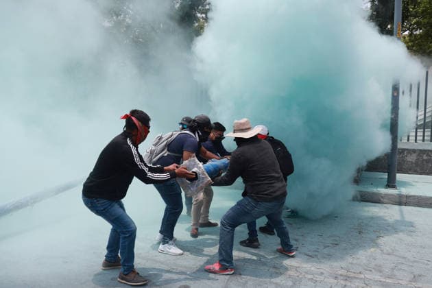 CNTE teachers hold third day of protests in Mexico City after declaring indefinite national strike MEXICO CITY, MEXICO - JUNE 03: Demonstrators attempt to breach the gates of the Mexico s Education Ministry building as riot police discharge fire extinguishers at them during a protest by CNTE teachers, in Mexico City, Mexico on June 03, 2026. Members of National Coordination of Education Workers (CNTE) forced their way into Mexico s Education Ministry building, causing damage to the facilities, as part of the third day of protests following the declaration of a national strike. Daniel Cardenas Anadolu Mexico City Mexico. Editorial use only. Please get in touch for any other usage.  Copyright: x2026xAnadoluxDanielxCardenasx