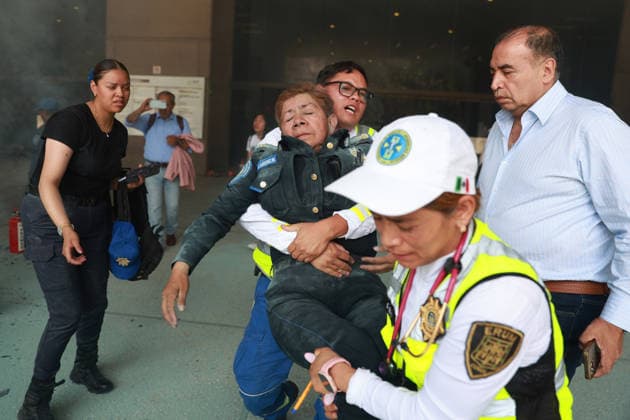 CNTE teachers hold third day of protests in Mexico City after declaring indefinite national strike MEXICO CITY, MEXICO - JUNE 03: An injured police officer is assisted by paramedics at Mexico s Education Ministry building during a protest by CNTE teachers, in Mexico City, Mexico on June 03, 2026. Members of National Coordination of Education Workers (CNTE) forced their way into Mexico s Education Ministry building, causing damage to the facilities, as part of the third day of protests following the declaration of a national strike. Daniel Cardenas Anadolu Mexico City Mexico. Editorial use only. Please get in touch for any other usage.  Copyright: x2026xAnadoluxDanielxCardenasx