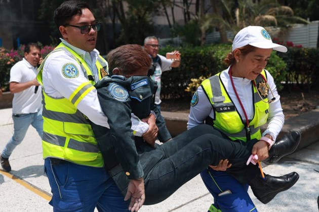CNTE teachers hold third day of protests in Mexico City after declaring indefinite national strike MEXICO CITY, MEXICO - JUNE 03: An injured police officer is assisted by paramedics at Mexico s Education Ministry building during a protest by CNTE teachers, in Mexico City, Mexico on June 03, 2026. Members of National Coordination of Education Workers (CNTE) forced their way into Mexico s Education Ministry building, causing damage to the facilities, as part of the third day of protests following the declaration of a national strike. Daniel Cardenas Anadolu Mexico City Mexico. Editorial use only. Please get in touch for any other usage.  Copyright: x2026xAnadoluxDanielxCardenasx