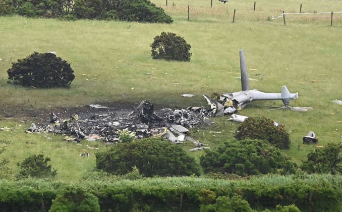 Royal Navy Helicopter Crash Devon 3rd June 2026. Three Royal Navy crew members died when their helicopter crashed into a field in Devon. They were taking part in a training exercise in the Royal Navy Merlin Mk4 when it crashed at Sourton Down, near Okehampton, Devon. Pictured: the crash site with Royal Navy personnel and emergency services in attendance.  Copyright: xWaynexperryx NINTCHDBPICT001085724791