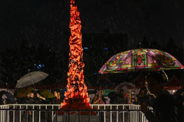 Taiwan holds commemoration for 37th anniversary of China s Tiananmen Square Massacre TAIPEI, TAIWAN - JUNE 4: People brace heavy rain to pay tribute in front of the replica of Pillar of Shame, at a commemoration for the 37th anniversary of China s Tiananmen Square Massacre, at Liberty Square in Taipei, Taiwan, on June 4, 2026. The commemoration pays tribute to civilians including student activists who were killed by the Chinese Communist Party-led government during the Tiananmen Square Massacre in Beijing on June 4, 1989. Taiwan is the last Chinese-speaking society in East Asia where such a commemoration is allowed, following the introduction of Beijing-imposed national security laws in Hong Kong and Macau. Daniel Ceng Anadolu Taipei Ta  Copyright: x2026xAnadoluxDanielxCengx