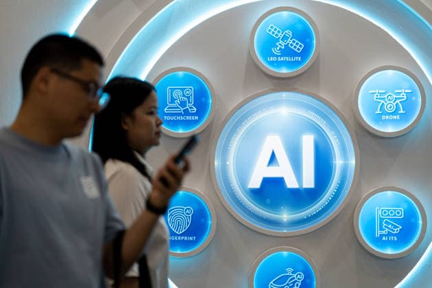 TAIWAN-COMPUTEX People walks pass an AI Logo at Computex 2026 in Taipei, Taiwan, June 4, 2026. NEXPHER Vernon Yuen TAIPEI