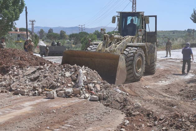 Lebanese Army announced that it has deployed to the town of Dibbin NABATIEH, LEBANON - JUNE 04: Israeli Army engineering vehicles clears the road by removing piles of dirt and rubble as the Lebanese Army announced that it had entered, where Israeli forces had recently withdrawn after carrying out attacks in the town of Dibbin, Nabatieh, Lebanon, on June 04, 2026. Ramiz Dallah Anadolu Nabatieh Lebanon. Editorial use only. Please get in touch for any other usage.  Copyright: x2026xAnadoluxRamizxDallahx