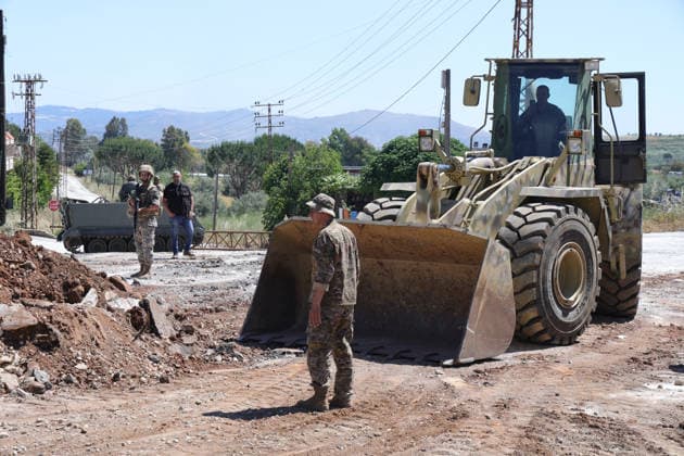 Lebanese Army announced that it has deployed to the town of Dibbin NABATIEH, LEBANON - JUNE 04: Israeli Army engineering vehicles clears the road by removing piles of dirt and rubble as the Lebanese Army announced that it had entered, where Israeli forces had recently withdrawn after carrying out attacks in the town of Dibbin, Nabatieh, Lebanon, on June 04, 2026. Ramiz Dallah Anadolu Nabatieh Lebanon. Editorial use only. Please get in touch for any other usage.  Copyright: x2026xAnadoluxRamizxDallahx