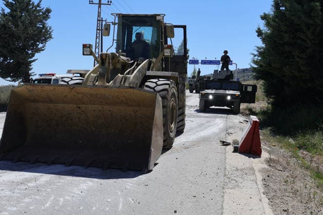 Lebanese Army announced that it has deployed to the town of Dibbin NABATIEH, LEBANON - JUNE 04: Israeli Army engineering vehicles clears the road by removing piles of dirt and rubble as the Lebanese Army announced that it had entered, where Israeli forces had recently withdrawn after carrying out attacks in the town of Dibbin, Nabatieh, Lebanon, on June 04, 2026. Ramiz Dallah Anadolu Nabatieh Lebanon. Editorial use only. Please get in touch for any other usage.  Copyright: x2026xAnadoluxRamizxDallahx