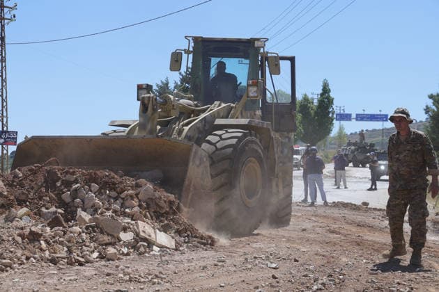 Lebanese Army announced that it has deployed to the town of Dibbin NABATIEH, LEBANON - JUNE 04: Israeli Army engineering vehicles clears the road by removing piles of dirt and rubble as the Lebanese Army announced that it had entered, where Israeli forces had recently withdrawn after carrying out attacks in the town of Dibbin, Nabatieh, Lebanon, on June 04, 2026. Ramiz Dallah Anadolu Nabatieh Lebanon. Editorial use only. Please get in touch for any other usage.  Copyright: x2026xAnadoluxRamizxDallahx