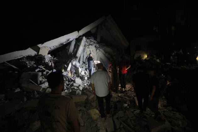 Israeli strike targets building in Nuseirat Camp, Gaza DEIR AL-BALAH, GAZA, PALESTINE - JUNE 4: Palestinians inspect the damaged building as the Israeli army targeted a building belonging to the Darwish family in the Nuseirat refugee camp in Deir al-Balah, Gaza, Palestine, on June 4, 2026. Hassan Jedi Anadolu Deir al-Balah Gaza. Editorial use only. Please get in touch for any other usage.  Copyright: x2026xAnadoluxHassanxJedix