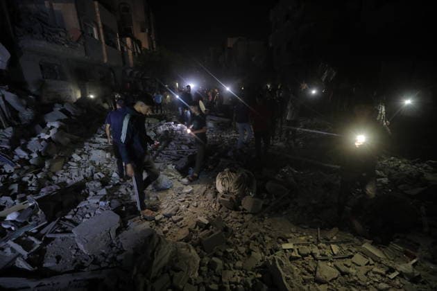 Israeli strike targets building in Nuseirat Camp, Gaza DEIR AL-BALAH, GAZA, PALESTINE - JUNE 4: Palestinians inspect the damaged building as the Israeli army targeted a building belonging to the Darwish family in the Nuseirat refugee camp in Deir al-Balah, Gaza, Palestine, on June 4, 2026. Hassan Jedi Anadolu Deir al-Balah Gaza. Editorial use only. Please get in touch for any other usage.  Copyright: x2026xAnadoluxHassanxJedix