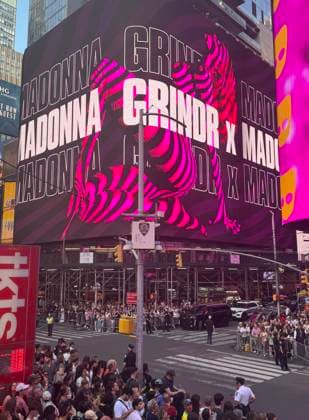June 4, 2026, New York, New York, USA: Signage and a view of the crowd for the Madonna surprise pop up concert partnered with the app Grindr in Time Square to promote her new album Confessions ll also called Confessions on the Dance Floor - Part ll. New York USA - ZUMAk03_ 20260604_zaf_k03_054 Copyright: xNancyxKaszermanx
