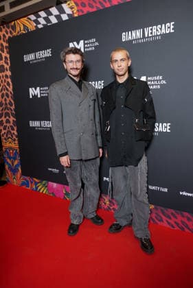 Jan Robert Allo, Victor Weinsanto Personalities at the first major French retrospective devoted to Gianni Versace at the Musée Maillol in Paris on June 4, 2026 Gianni Versace Retrospective brings together nearly 450 exceptional pieces - original creations and silhouettes, accessories, sketches, decorative objects, photographs, In a resolutely pop scenography designed by Nathalie Crinière, the exhibition retraces an entire career dedicated to creation, and reveals the multiple inspirations that shaped Versaces universe  Copyright: xAnne-SophiexGuebeyx xBestimagexAnne-SophiexGuebeyx xBestimagex