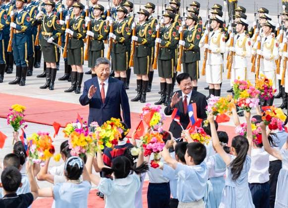 (260605) -- BEIJING, June 5, 2026 -- General Secretary of the Communist Party of China Central Committee and Chinese President Xi Jinping holds a welcome ceremony for General Secretary of the Lao People s Revolutionary Party Central Committee and Lao President Thongloun Sisoulith at the square outside the east gate of the Great Hall of the People ahead of their talks in Beijing, capital of China, June 5, 2026. Xi held talks with Thongloun, who is on a state visit to China, at the Great Hall of the People in Beijing on Friday. ) CHINA-BEIJING-XI JINPING-LAOS-THONGLOUN-TALKS (CN) LixTao 