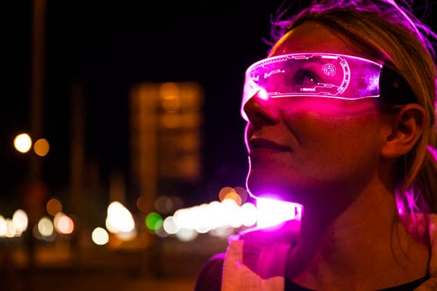 Portrait of woman with pink augmented reality visor in city at night model released, Symbolfoto, UUF36909