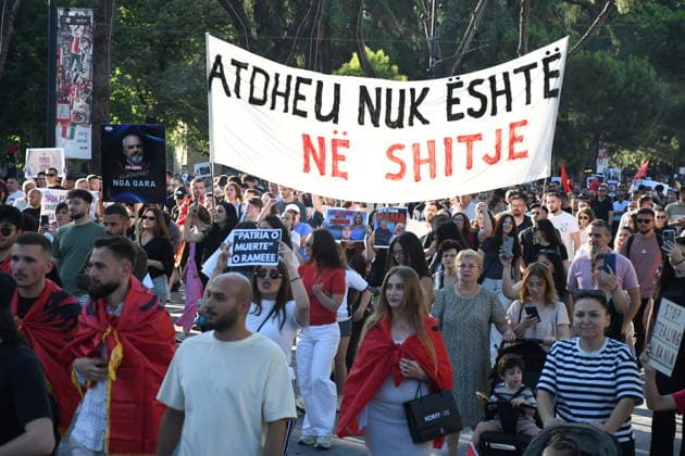 Protest against tourism project in Albania drawing thousands of participants TIRANA, ALBANIA - JUNE 5: Thousands gather at the historic Skanderbeg Square in Tirana, Albania on June 5, 2026, to protest against a controversial luxury tourism development project planned for the ecologically sensitive Zvernec area in the coastal city of Vlora. The massive rally marks an escalation in public outcry over allegations that prime, state-owned coastal lands are being sold off to high-profile foreign investors linked to Jared Kushner and Ivanka Trump, the son-in-law and daughter of US President Donald Trump. Olsi Shehu Anadolu Tirana Albania. Editorial use only. Please get in touch for any other usage.  Copyright: x2026xAnadoluxOlsixShehux