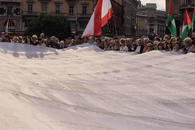 Demonstration in memory of Palestinian children victims in Milan MILAN, ITALY - JUNE 5: A demonstration in memory of Palestinian children victims of Israeli attacks begins in Piazza Duomo and march through the city carrying a symbolic 25-meter-long shroud bearing the names of the 18,457 young victims in Milan, Italy, on June 5, 2026. Andrea Carrubba Anadolu Milan Italy. Editorial use only. Please get in touch for any other usage.  Copyright: x2026xAnadoluxAndreaxCarrubbax