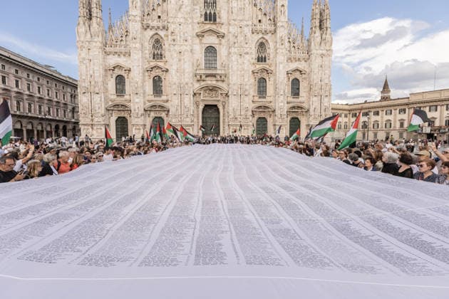 Demonstration in memory of Palestinian children victims in Milan MILAN, ITALY - JUNE 5: A demonstration in memory of Palestinian children victims of Israeli attacks begins in Piazza Duomo and march through the city carrying a symbolic 25-meter-long shroud bearing the names of the 18,457 young victims in Milan, Italy, on June 5, 2026. Andrea Carrubba Anadolu Milan Italy. Editorial use only. Please get in touch for any other usage.  Copyright: x2026xAnadoluxAndreaxCarrubbax