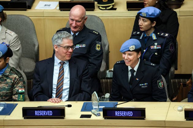 June 5, 2026, New York, New York, USA: STEPHANIE KONIGS smiles with Ambassador RICKLEF BEUTIN, Permanent Representative of Germany to the UN, after receiving the 2025 UN Woman Police Officer of the Year Award during the International Day of UN Peacekeepers ceremony at UNHQ. New York USA - ZUMAo116 20260605_znp_o116_011 Copyright: xBiancaxOterox