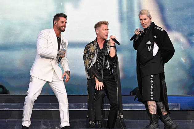 Boyzone performing at Emirates Stadium LONDON, ENGLAND - JUNE 05: Keith Duffy, Ronan Keating and Shane Lynch of ˜Boyzone™ performing at Emirates Stadium on June 05, 2026 in London, England CAP MAR MAR Great Britain UK Copyright: xMartinxHarris CapitalxPicturesx