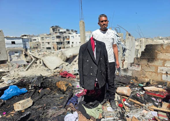 Palestinians Inspect Site of Deadly Strike in Khan Younis Palestinians inspect the damage at the site of an Israeli strike that targeted a tent belonging to the family of Mohannad Farwana on the rooftop of their home in central Khan Younis, southern Gaza Strip, on June 6, 2026. Farwana was killed after the tent caught fire in the strike, just hours before his scheduled wedding ceremony. Photo by Tariq Mohammad APA Images Khan Yunis Gaza Strip Palestinian Territory 060626_Khan_Yunis_TM_00(17) Copyright: xapaimagesxTariqxMohammad xapaimagesx