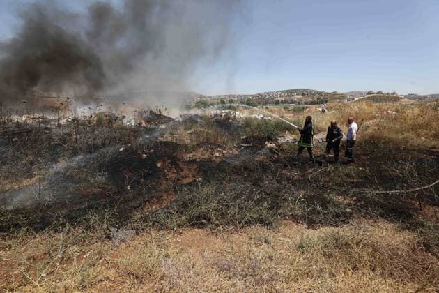 Israeli settlers set fire to Palestinians agricultural fields in the West Bank NABLUS, WEST BANK, PALESTINE - JUNE 06: Palestinians attempt to extinguish the fire using their own means after Israeli settlers set fire to agricultural fields belonging to Palestinians in the town of Huwara, near Nablus, West Bank, Palestine on June 06, 2026. Nedal Eshtayah Anadolu Nablus West Bank. Editorial use only. Please get in touch for any other usage.  Copyright: x2026xAnadoluxNedalxEshtayahx