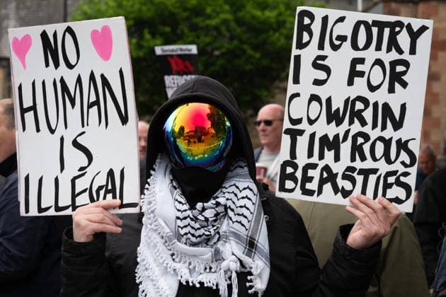 June 6, 2026, Perth, Scotland, UK: Anti-immigration protesters held a demonstration outside The Queens Hotel in Perth, while pro-immigration protesters aligned with Perth Against Racism staged a Reject Hate And Division counter-demonstration outside the Radisson Blu Hotel opposite. Both hotels are being used to house asylum seekers and have been the focus of similar protests in recent months. Perth UK  - ZUMAs357 20260606_zip_s357_019 Copyright: xCameronxScottx