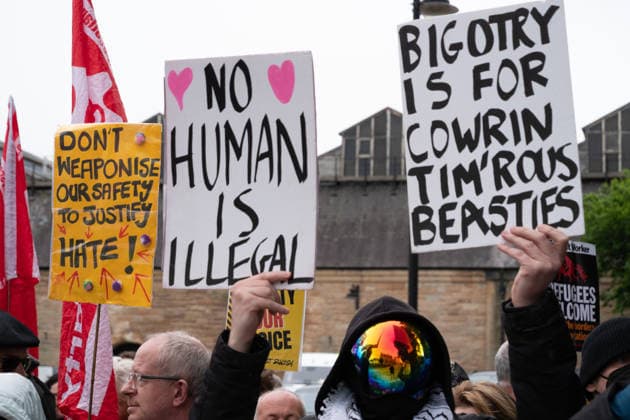 June 6, 2026, Perth, Scotland, UK: Anti-immigration protesters held a demonstration outside The Queens Hotel in Perth, while pro-immigration protesters aligned with Perth Against Racism staged a Reject Hate And Division counter-demonstration outside the Radisson Blu Hotel opposite. Both hotels are being used to house asylum seekers and have been the focus of similar protests in recent months. Perth UK  - ZUMAs357 20260606_zip_s357_020 Copyright: xCameronxScottx