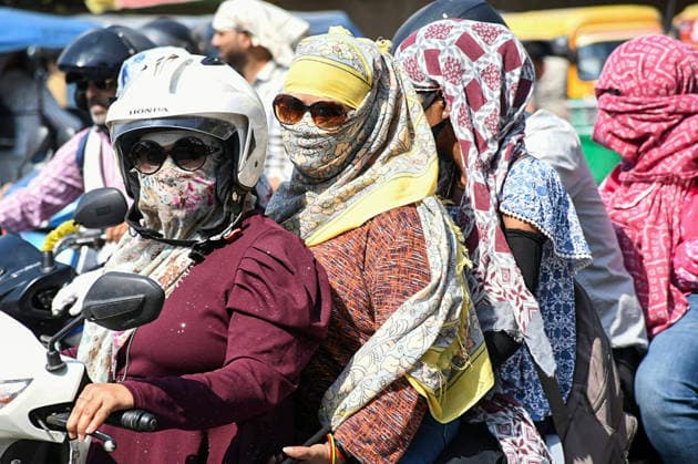 Women cover themselves with scarves as they ride a scooty on a hot summer day Kanpur, Jun 06 (ANI): Women cover themselves with scarves as they ride a scooty on a hot summer day, in Kanpur on Saturday. Kanpur Uttar Pradesh India Copyright: xANIx ANI_20260606226