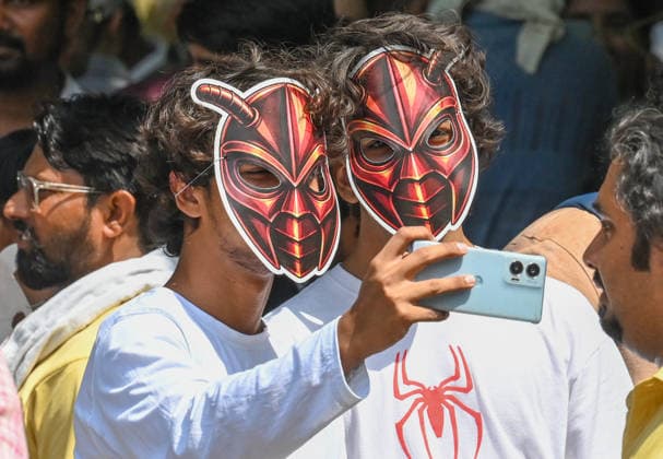 NEW DELHI, INDIA - JUNE 6: A Cockroach Janta Party (CJP) supporter during a protest over alleged irregularities in the country s major examinations on June 6, 2026 in New Delhi, India. Members and supporters of the Cockroach Janta Party (CJP) protest at Jantar Mantar to demand the resignation of Union Minister of Education, Dharmendra Pradhan. They claimed him to be directly responsible for the recent exam paper leaks in major national-level examinations across the country, including NEET. The party was started as a satirical online movement after remarks made by Chief Justice Surya Kant during a hearing. CJI Kant compared a section of young unemployed youth with fake law degrees to cockroaches. (Photo by Raj K Raj Hindustan Tim