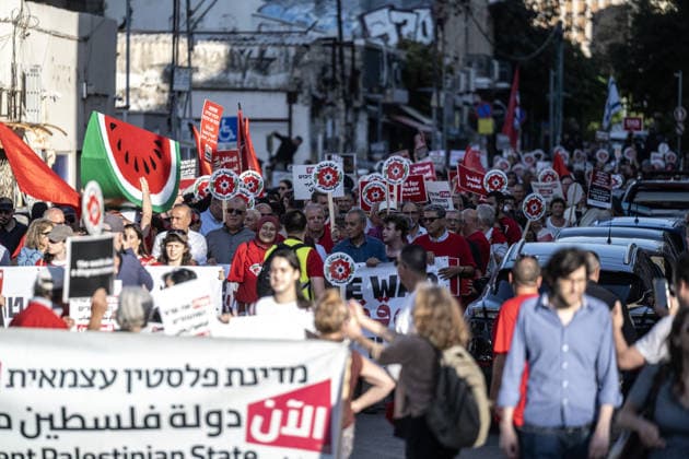 Protest in Haifa to mark the 59th anniversary of Naksa HAIFA, ISRAEL - JUNE 6: Hundreds of people gathered to mark the 59th anniversary of the Naksa, commemorating the aftermath of the 1967 Arab-Israeli War, when Israel occupied remaining Palestinian territories in Haifa, Israel on June 6, 2026. Demonstrators marched through city streets carrying placards, calling for an end to ongoing violence and policies in the region. Mostafa Alkharouf Anadolu Haifa Israel. Editorial use only. Please get in touch for any other usage.  Copyright: x2026xAnadoluxMostafaxAlkharoufx