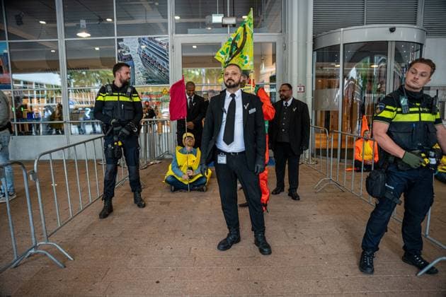 June 6, 2026, Rotterdam, South Holland, Netherlands: Rotterdam, Netherlands, 6 June 2026. Extinction Rebellion activists blocked the entrance to the Cruise Terminal on the Wilhelminakade on World Anti-Cruise Day. This temporarily preventing cruise passengers from boarding a moored cruise ship. Several activists were detained and four were arrested. Rotterdam Netherlands  - ZUMAp202 20260606_zip_p202_019 Copyright: xJamesxPetermeierx