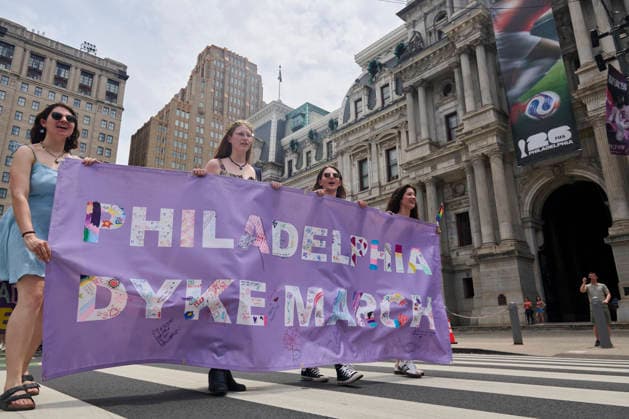 June 6, 2026, Philadelphia, Pennsylvania, USA: People march past City Hall in downtown Philadelphia to protest civil rights abuses against those who identify as LGBTQIA2S+ as part of the annual 2026 Philadelphia Dyke March. Philadelphia, PA, June 5, 2026. Philadelphia USA - ZUMAg216 20260606_znp_g216_012 Copyright: xDominicxGwinnx