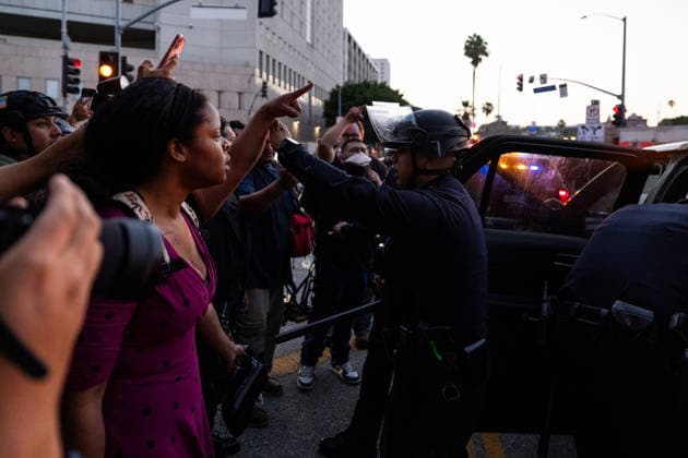 LOS ANGELES, CA - JUNE 06: Anti-ICE demonstrators clash with police officers outside a federal detention center on June 6, 2026 in Los Angeles, California.  Copyright: xVCGx 111646651198