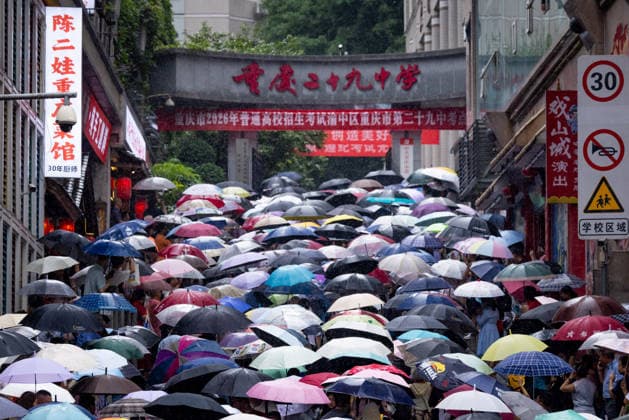 GAOKAO in Chongqing CHONGQING, CHINA - JUNE 7, 2026 - Students who took the exam braved the rain and walked out of the examination room at the No.29 Middle School after the first exam of the college entrance examination ended in Chongqing, China on June 7, 2026. Chongqing Chongqing China  Copyright: xCFOTOx i1780843680948