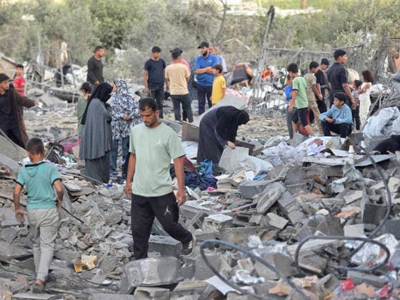 Palestinians Inspect Destruction After Strike on Displacement Area Palestinians inspect the destruction caused by an Israeli airstrike that targeted tents and shelters for displaced people in the Mawasi area of Khan Younis, southern Gaza Strip, on June 7, 2026. Debris and personal belongings were scattered across the sandy area as residents searched through the wreckage of their damaged shelters. Photo by Tariq Mohammad APA Images Khan Yunis Gaza Strip Palestinian Territory 070626_Khan_Yunis_TM_00(44) Copyright: xapaimagesxTariqxMohammad xapaimagesx