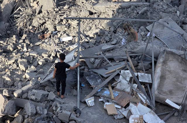Palestinians Inspect Destruction After Strike on Displacement Area Palestinians inspect the destruction caused by an Israeli airstrike that targeted tents and shelters for displaced people in the Mawasi area of Khan Younis, southern Gaza Strip, on June 7, 2026. Debris and personal belongings were scattered across the sandy area as residents searched through the wreckage of their damaged shelters. Photo by Tariq Mohammad APA Images Khan Yunis Gaza Strip Palestinian Territory 070626_Khan_Yunis_TM_00(21) Copyright: xapaimagesxTariqxMohammad xapaimagesx