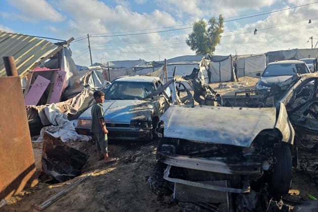 Palestinians Inspect Destruction After Strike on Displacement Area Palestinians inspect the destruction caused by an Israeli airstrike that targeted tents and shelters for displaced people in the Mawasi area of Khan Younis, southern Gaza Strip, on June 7, 2026. Debris and personal belongings were scattered across the sandy area as residents searched through the wreckage of their damaged shelters. Photo by Tariq Mohammad APA Images Khan Yunis Gaza Strip Palestinian Territory 070626_Khan_Yunis_TM_00(3) Copyright: xapaimagesxTariqxMohammad xapaimagesx