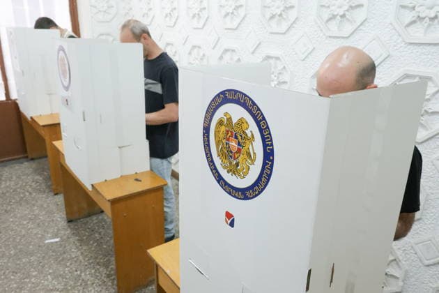 ARMENIA, YEREVAN - JUNE 7, 2026: People vote in the 2026 Armenian parliamentary election. Alexander Patrin TASS  93505267