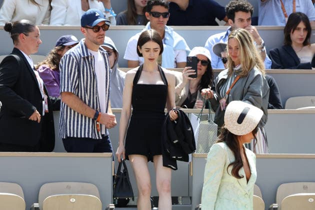 2026 French Open - Lily Collins In The Stands Charlie McDowell, Lily Collins and Ashley Park in the stands during Day Fifteen of the 2026 French Open on June 07, 2026 in Paris, France. Photo by Nasser Berzane ABACAPRESS.COM Paris France  Copyright: xBerzanexNasser ABACAx